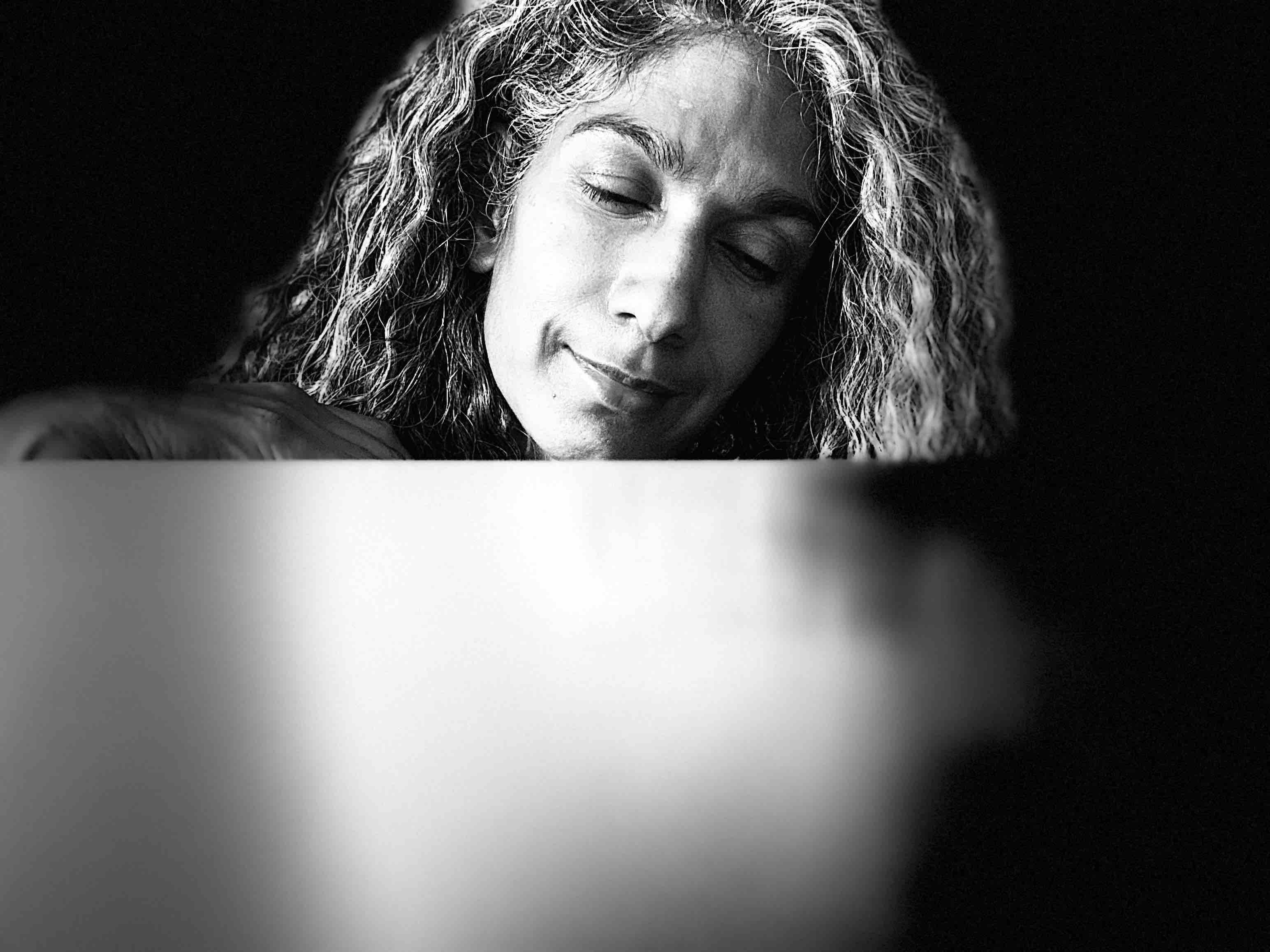 Image of Ameetha Palanki in front of laptop